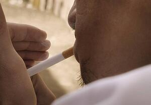 Man smokes a cigarette