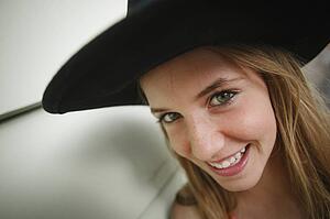 A smile and a hat