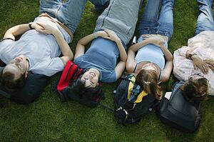 A group of young people napping