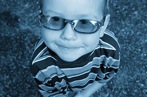 A cute child with trendy sunglasses