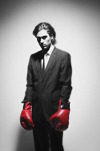 Businessman with boxing gloves