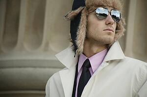 Businessman with hat and overcoat