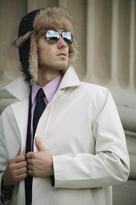 Businessman with hat and overcoat