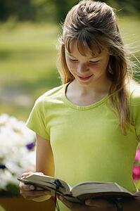 Girl reads a book
