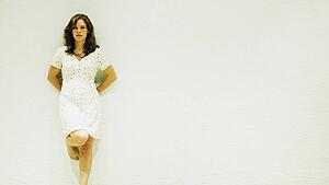 Portrait of a woman in a white dress
