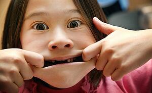Child makes a funny face