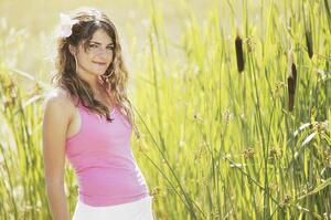 Girl posing in reeds