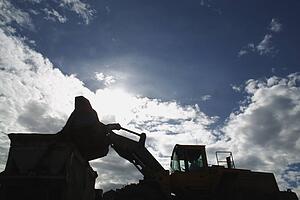 Silhouette of front-end loader