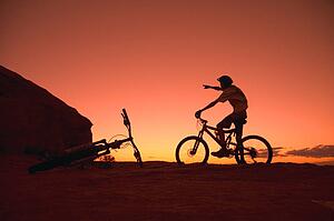 Person on bike pointing
