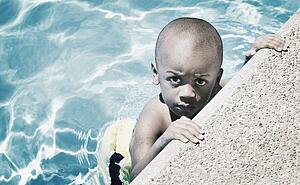 young child in pool