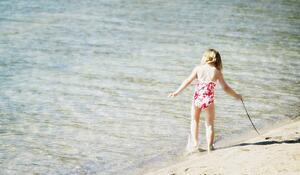 Girl playing in water