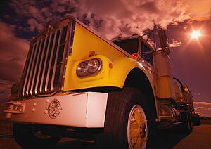 Closeup of a yellow semi