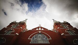 Looking up at church