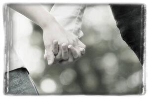 Couple holding hands
