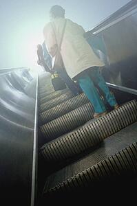 People on escalator