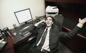 Businessman in office talking on phone