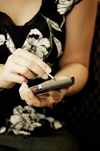 Woman using a PDA