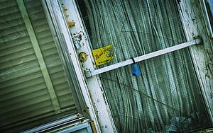 Old door with cracked glass