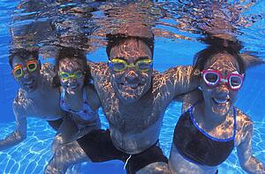 Family group in swimming pool