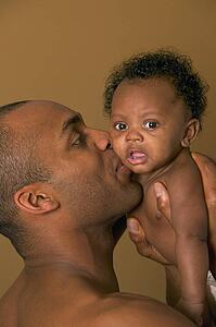 Father holding baby