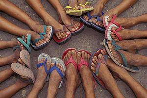 Group of feet in sandals