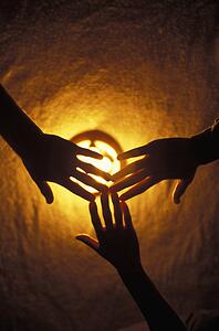 Hands over light