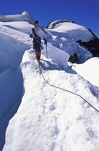 Mountaineer on snowy slope