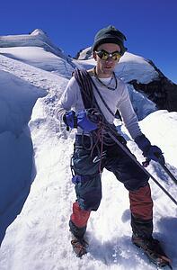 Mountaineer on a snowy slope