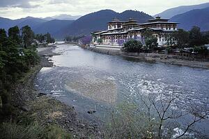 Building beside small body of water