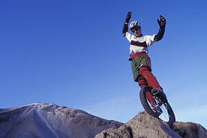 Man on unicycle