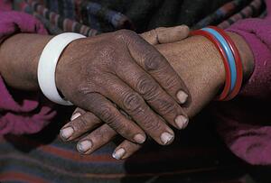 Ethnic hands folded