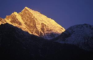 Illuminated mountain peak