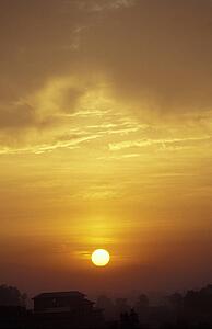 Sunset over a house