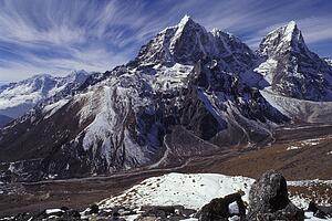Mountain range with valley in forefront