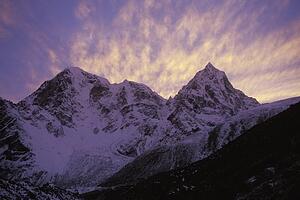Snowy mountain in shadow