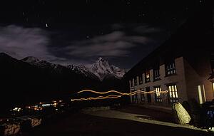 Building in the mountains at night