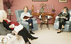 Group of women studying Bible