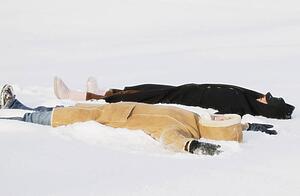 Two teen girls in snow