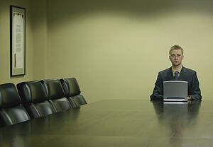 Lone businessman with laptop