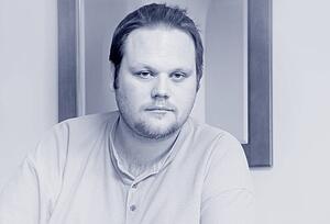 Single man staring into space