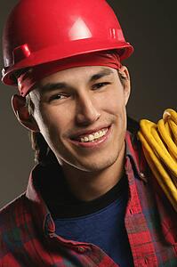 Aboriginal Workman wearing a hard hat