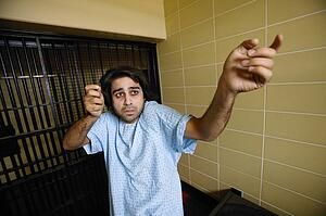 Man in hospital gown