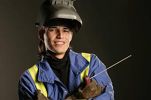 Aboriginal man with welding equipment