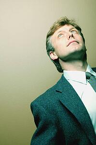 Businessman looking up