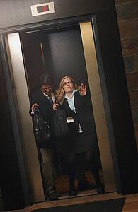 Fighting to get out of the elevator first