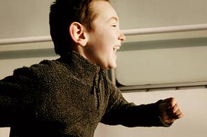 Young boy running