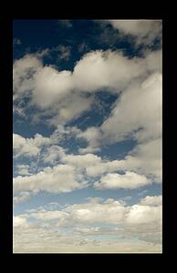 Looking out window at clouds