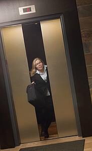 Late for work-getting off elevator