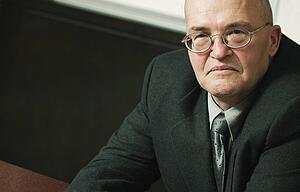 Stern looking older man