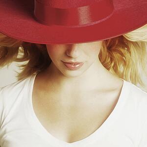 Female model wearing red hat